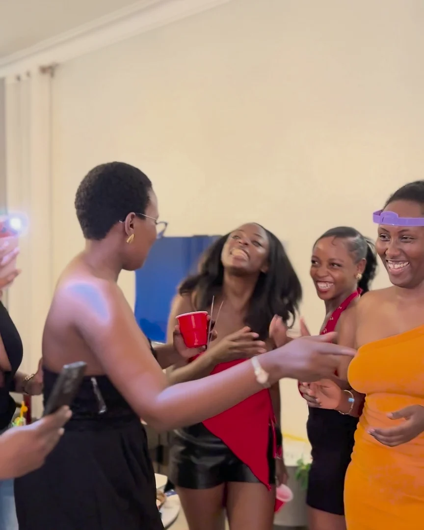 Friends laughing at a Hot Deck house party